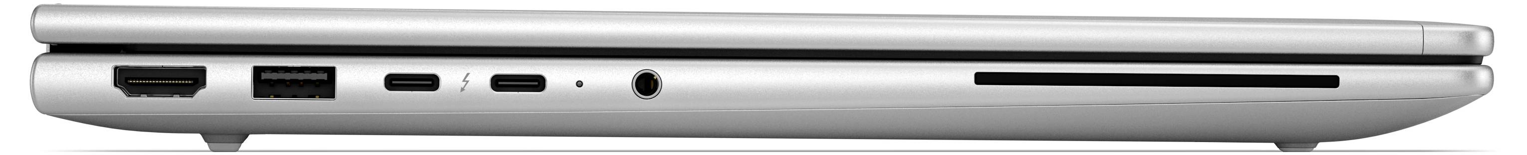 Seitenansicht eines geschlossenen silbernen Laptops mit Anschlüssen an der linken Kante, einschließlich USB, Audiobuchse und Stromstecker.