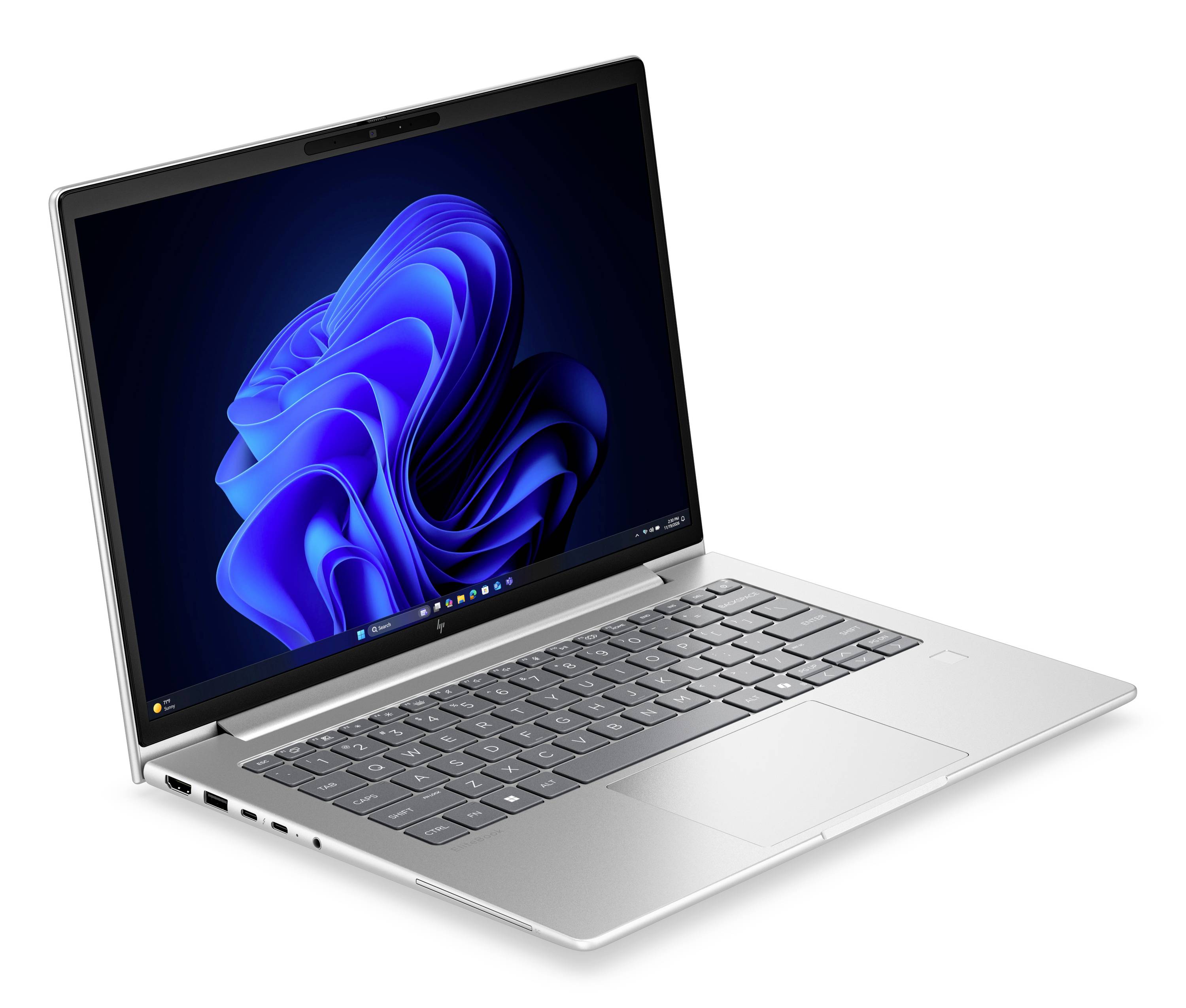 Silberner Laptop auf weißem Hintergrund geöffnet, auf dem Bildschirm wird eine blaue abstrakte Windows-ähnliche Tapete angezeigt.