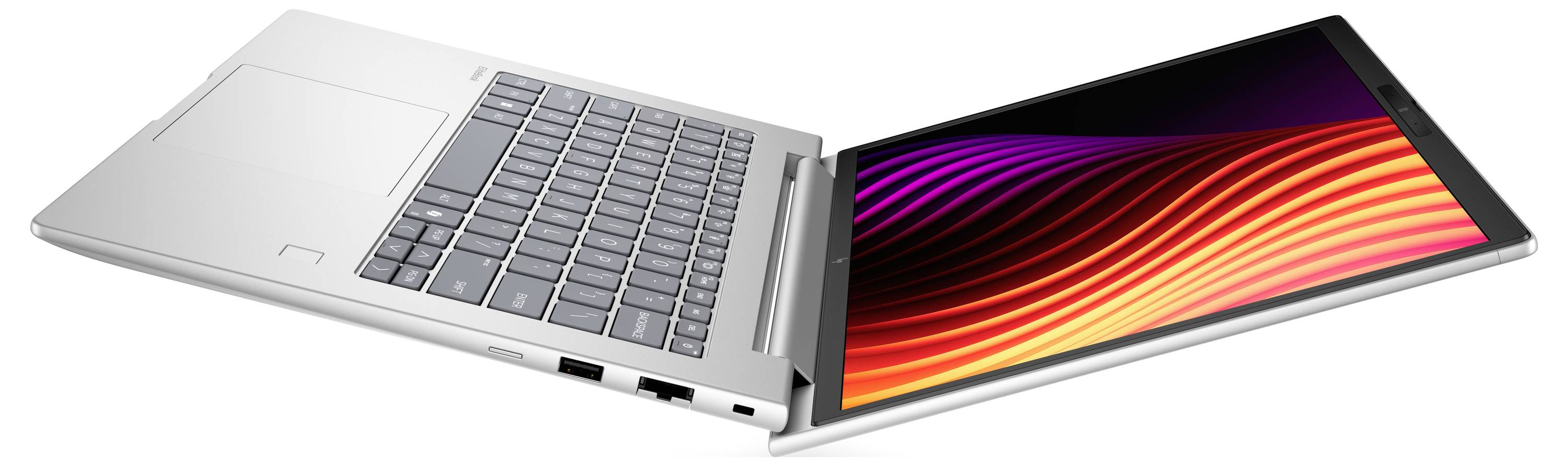 Silberner Laptop, der in einem Winkel geöffnet angezeigt wird und ein farbenfrohes Wellenmuster auf dem Bildschirm gegen einen weißen Hintergrund zeigt.