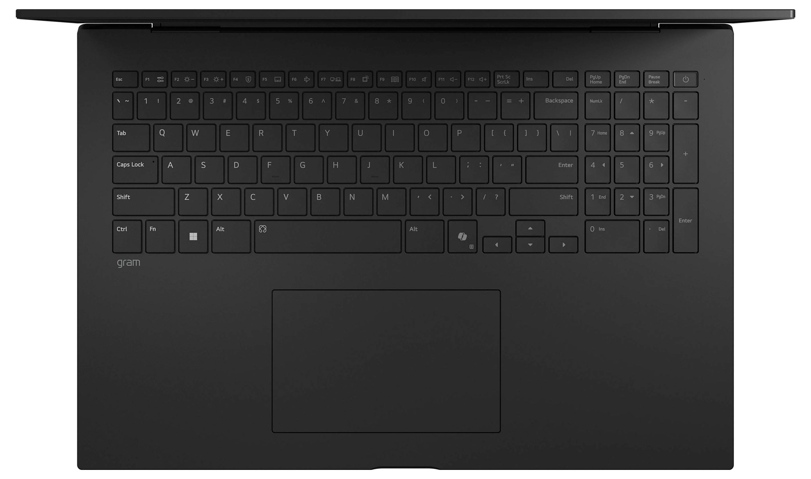 Draufsicht eines schwarzen Laptops, auf der Tastatur und das große zentrierte Touchpad zu sehen sind.