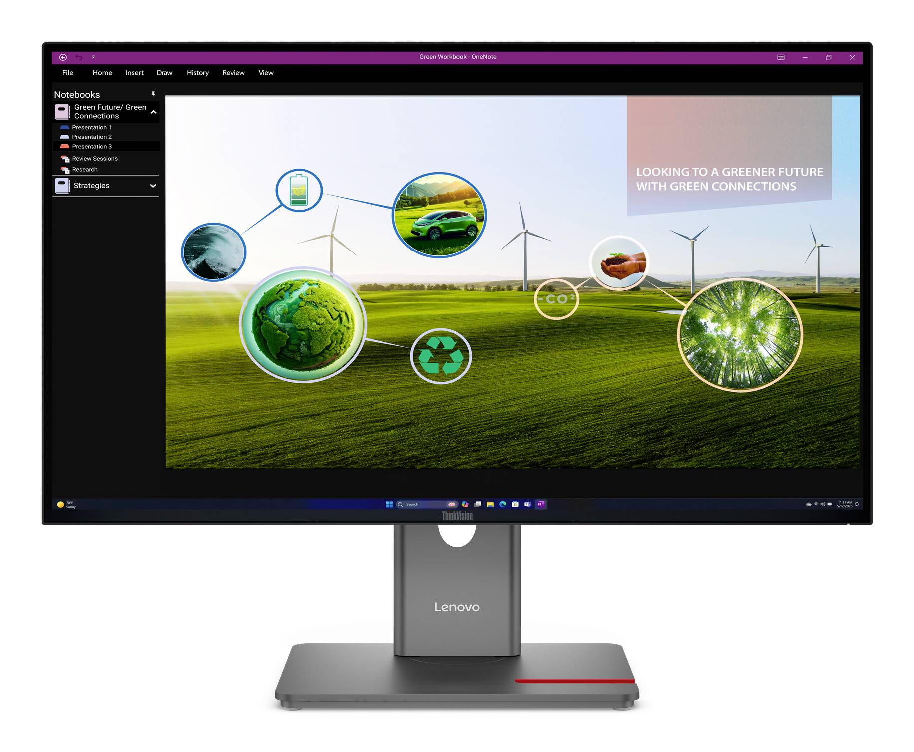 Lenovo-Monitor, auf dem eine Präsentation zur grünen Energie mit Windkraftanlagen, Ökosymbolen und dem Text „LOOKING TO A GREENER FUTURE WITH GREEN CONNECTIONS
