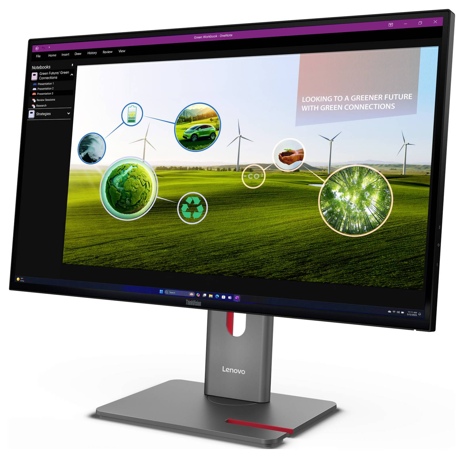 Lenovo-Monitor zeigt eine Präsentation über grüne Energie mit Windkraftanlagen, Öko-Symbolen und dem Text „Mit grünen Verbindungen auf dem Weg zu einer grüneren Zukunft