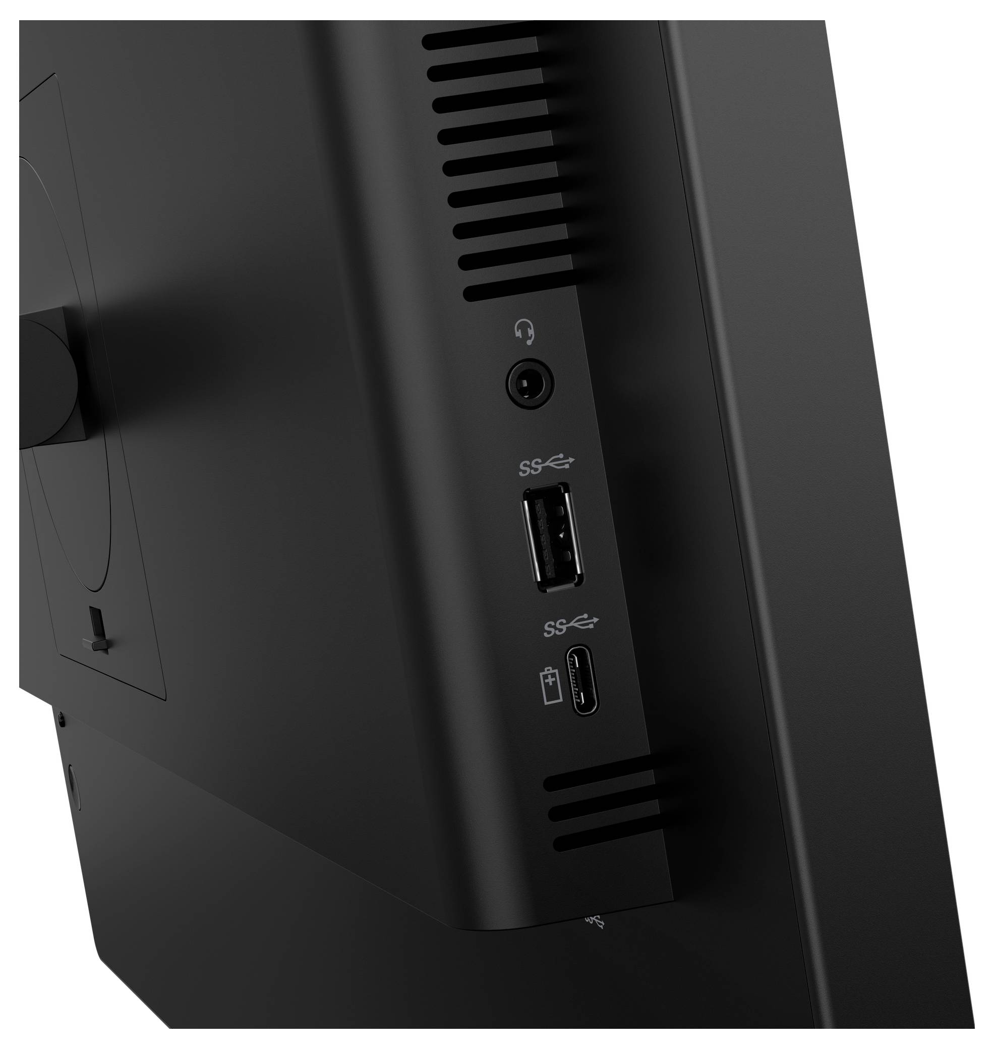 Nahaufnahme eines schwarzen Monitor- oder Computer-Tower-Seitenpanels, das Belüftungsschlitze, eine Kopfhörerbuchse, einen USB-Anschluss und einen USB-C-Anschluss zeigt.