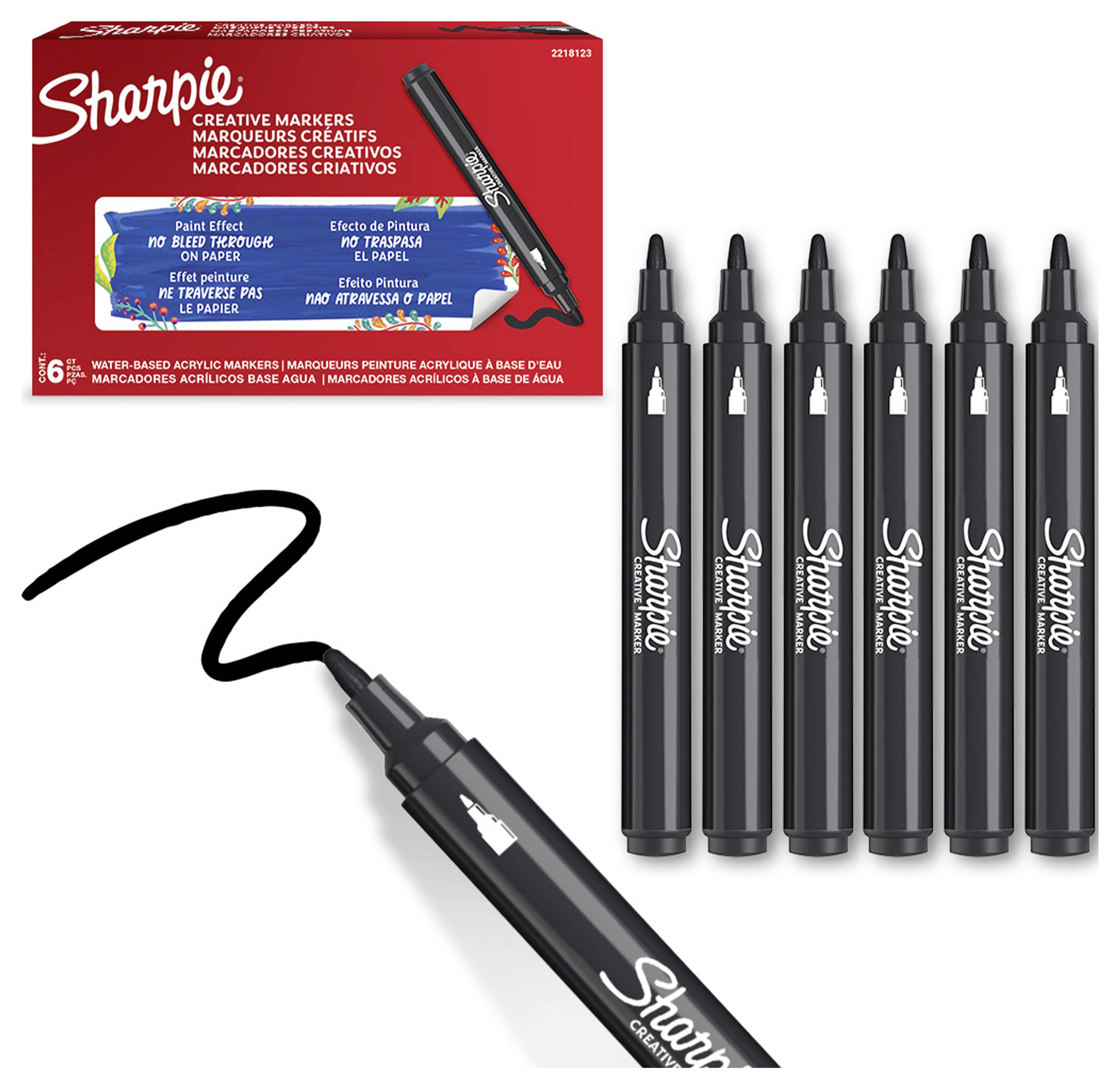 Sharpie Creative Markers Paket mit sechs schwarzen Farbbenutzern und einem Muster-Schwarzstrich auf weißem Hintergrund.