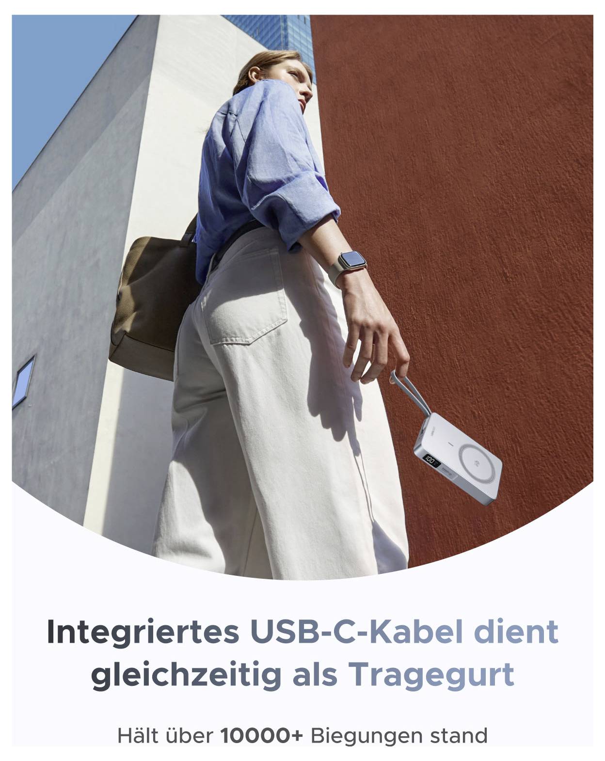 Person steht neben einer Wand und hält ein Gerät mit einem integrierten USB-C-Kabel, das als Trageband verwendet wird; die Beschriftung besagt, dass es über 10.000 Biegungen aushält.