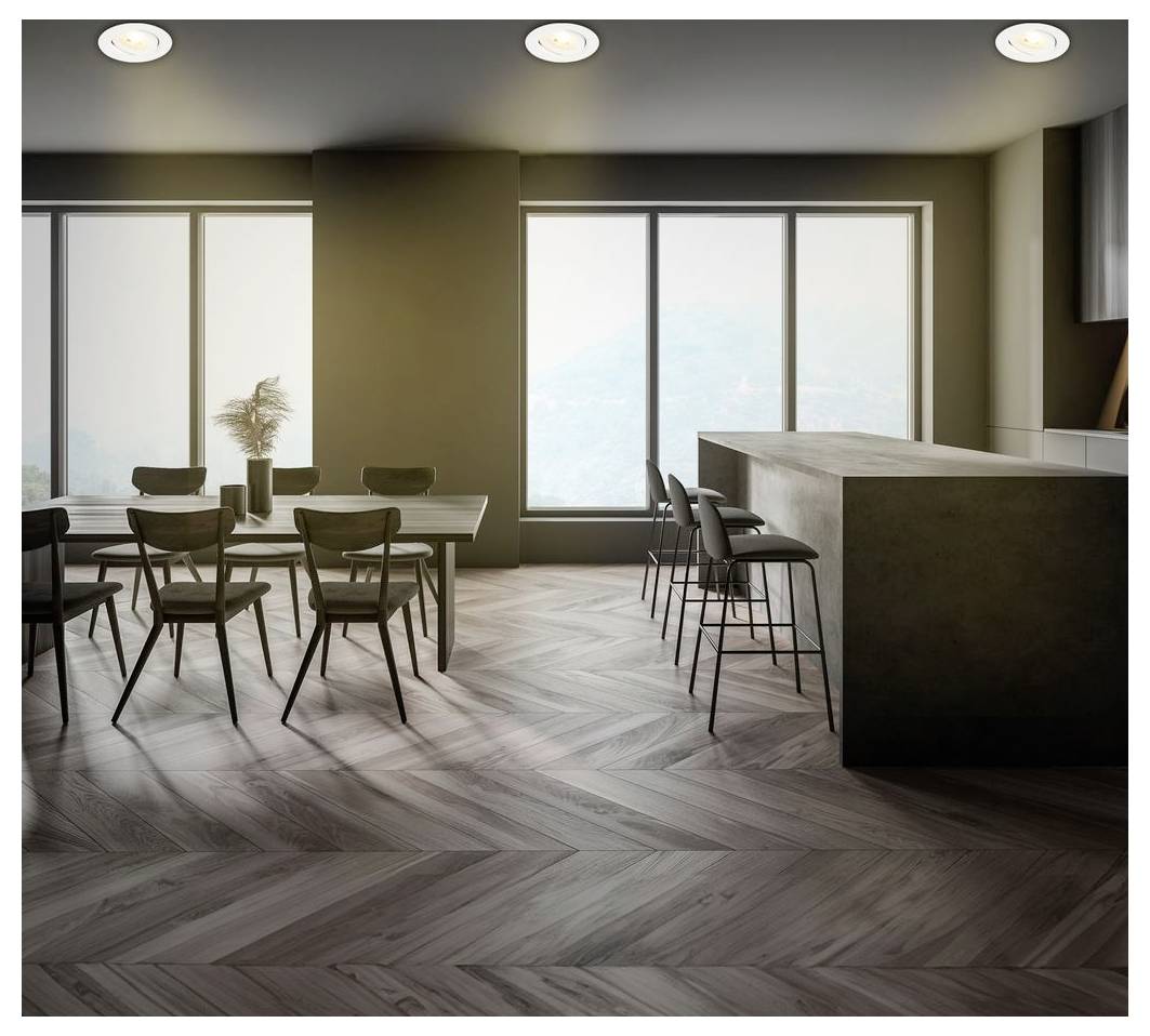 Schwarzer eingebauter Deckenspot mit schwarzem Finish, in Nahaufnahme vor einem unscharfen, badezimmerähnlichen Hintergrund gezeigt.