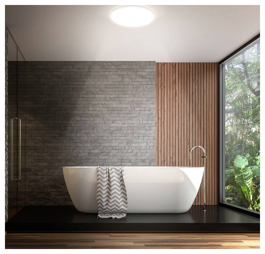 Modernes Minimalist-Badezimmer mit zwei Aufsatzwaschbecken, schwarzgerahmter Glasdusche und einer Topfpflanze neben einem sonnigen Fenster.