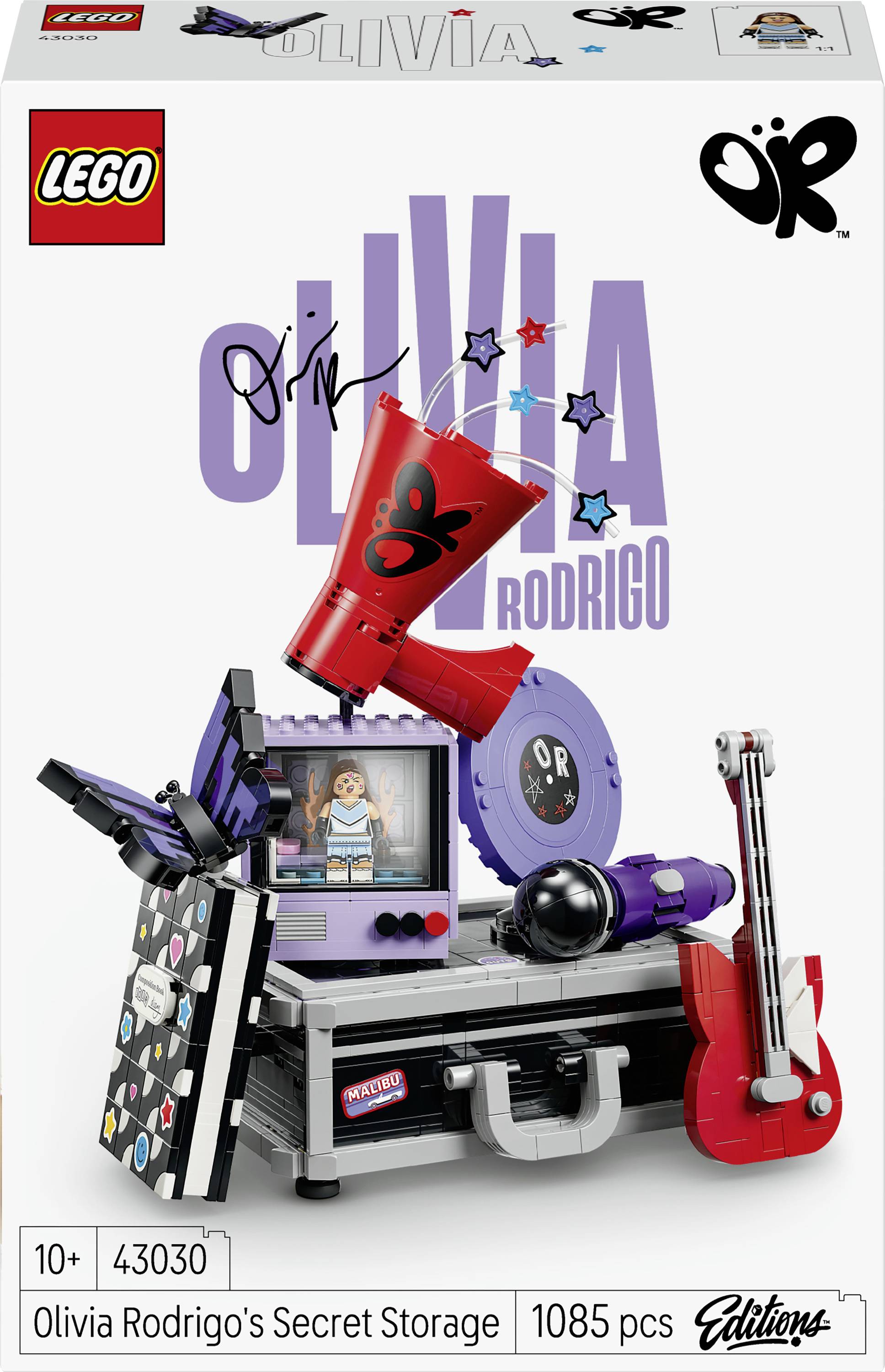 LEGO Olivia Rodrigo's Secret Storage Baukasten-Verpackung mit einem schwarz-violetten Ausstellungskasten, einer roten Gitarre und Zubehör, gekennzeichnet mit 43030, 1085 Teile, 10+.