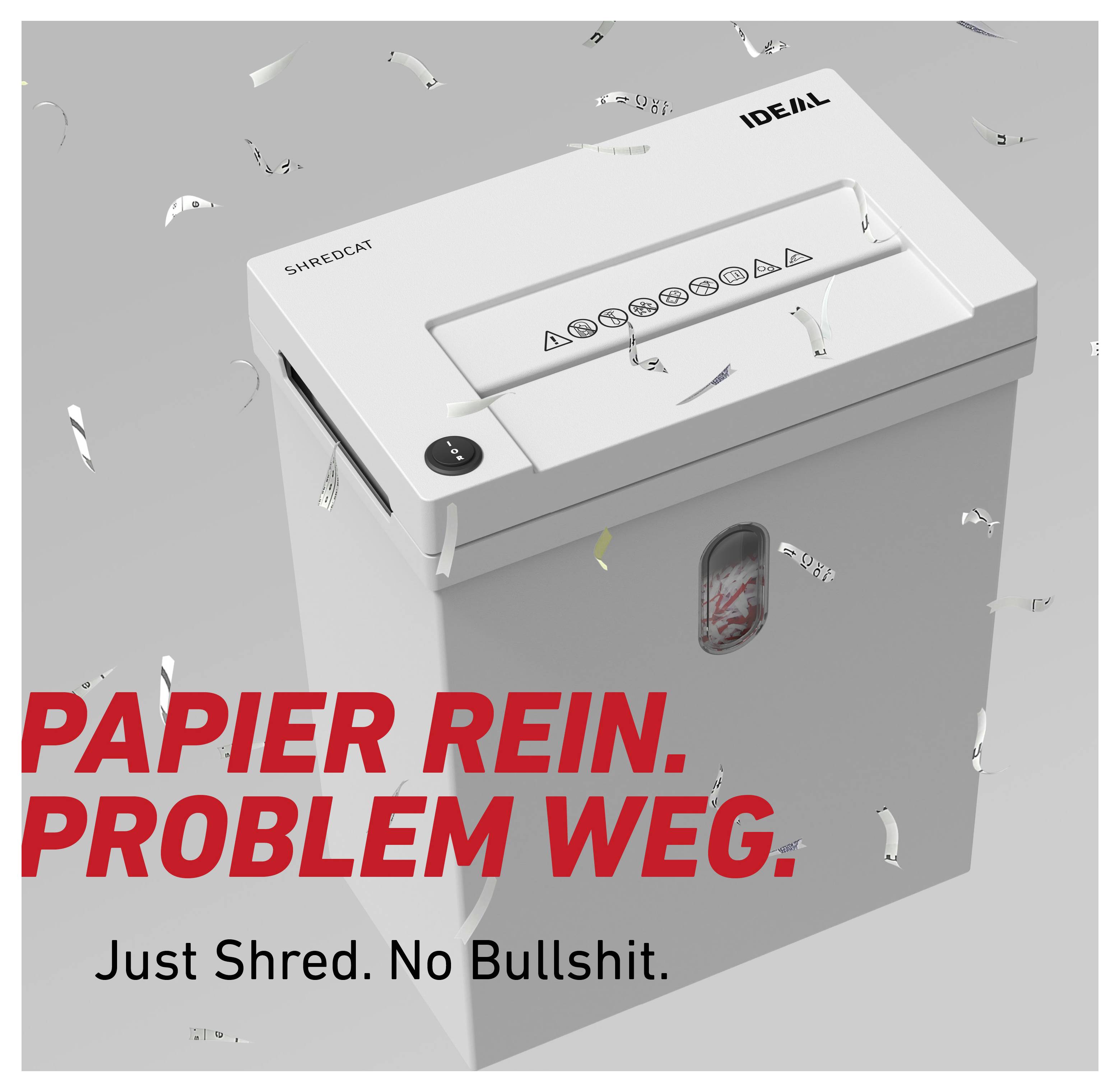 Werbeplakat für einen Aktenvernichter von IDEAL; weißes Gerät mit Konfetti, Text: 'PAPIER REIN. PROBLEM WEG.' und 'Just Shred. No Bullshit.'
