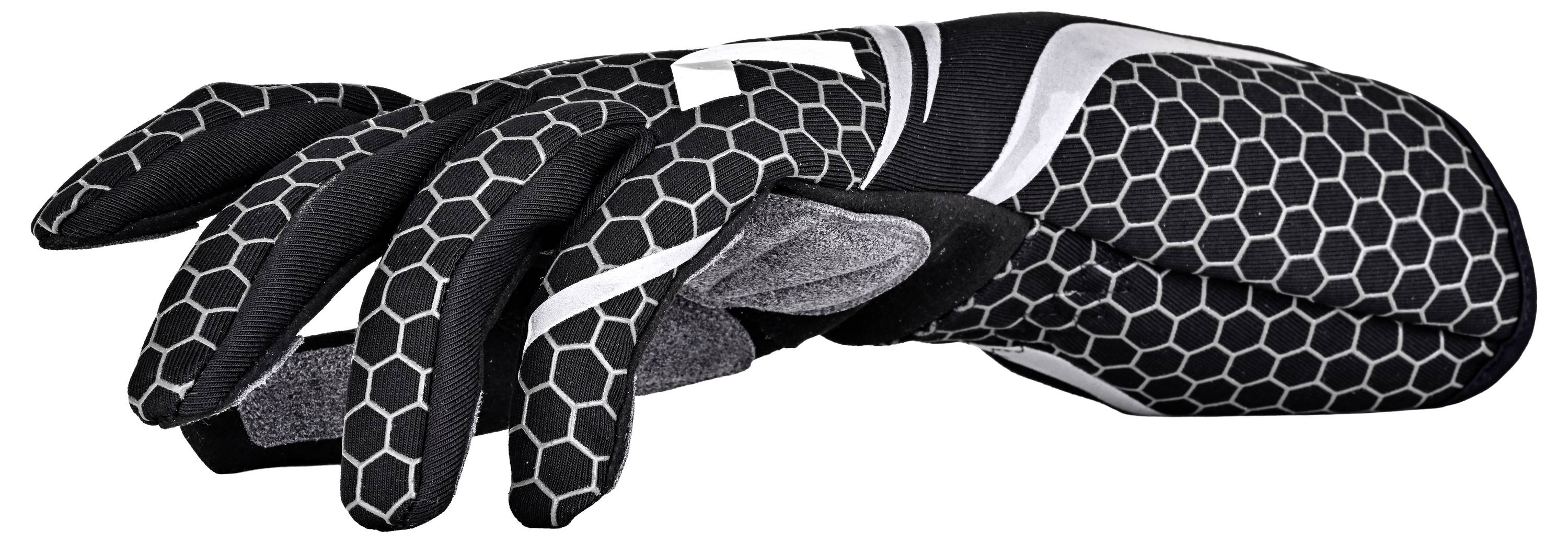 Schwarz gemusterter Handschuh mit weißen Akzenten, in Seitenansicht vor weißem Hintergrund dargestellt.