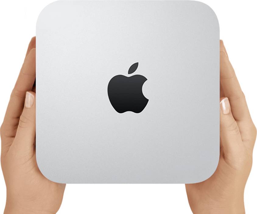 Hände halten einen silbernen Apple Mac mini mit dem schwarzen Apple-Logo in der Mitte der Vorderseite.