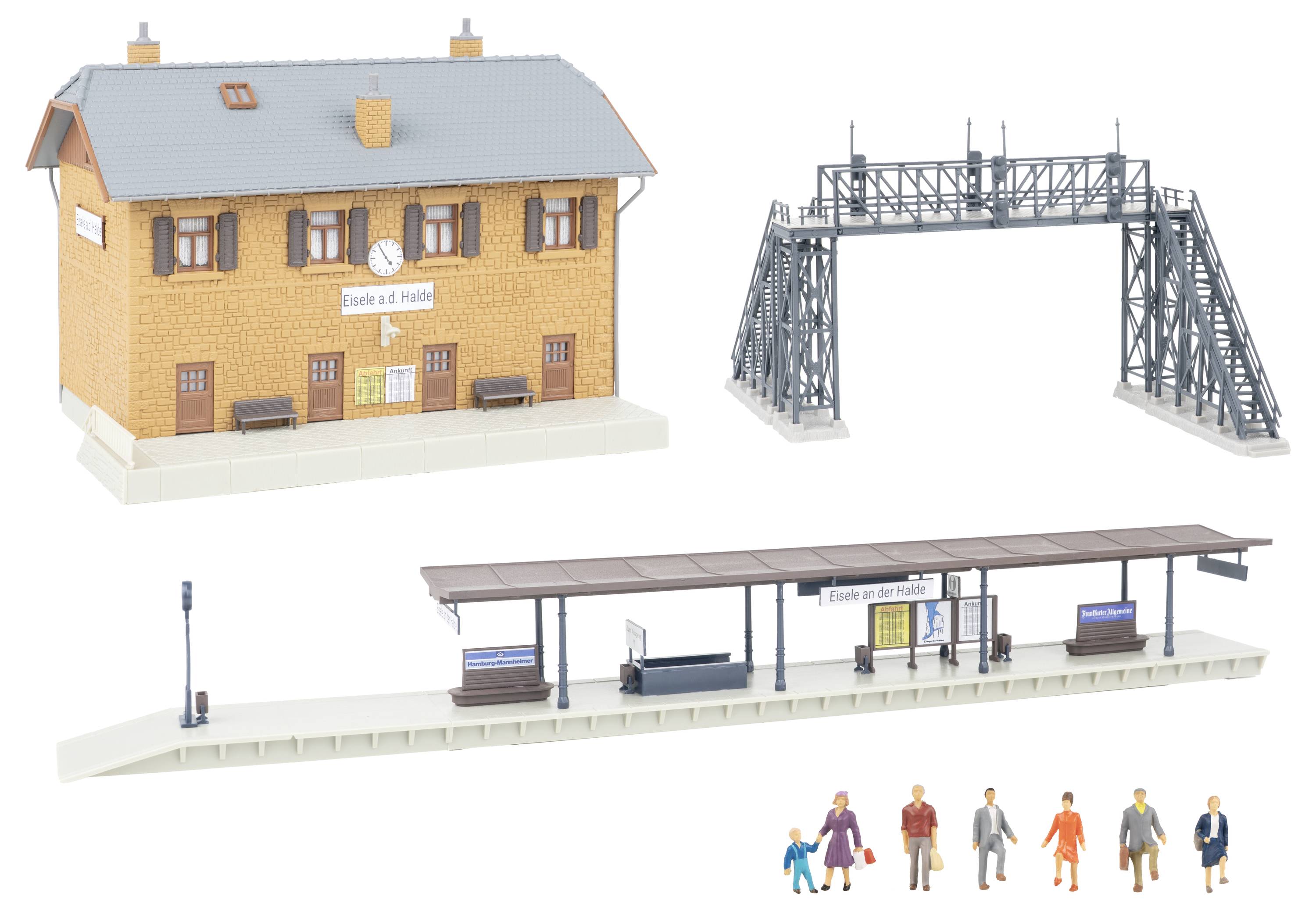 Modelleisenbahn-Szenerie mit Bahnhofsgebäude mit der Bezeichnung „Eisle a. d. Helle