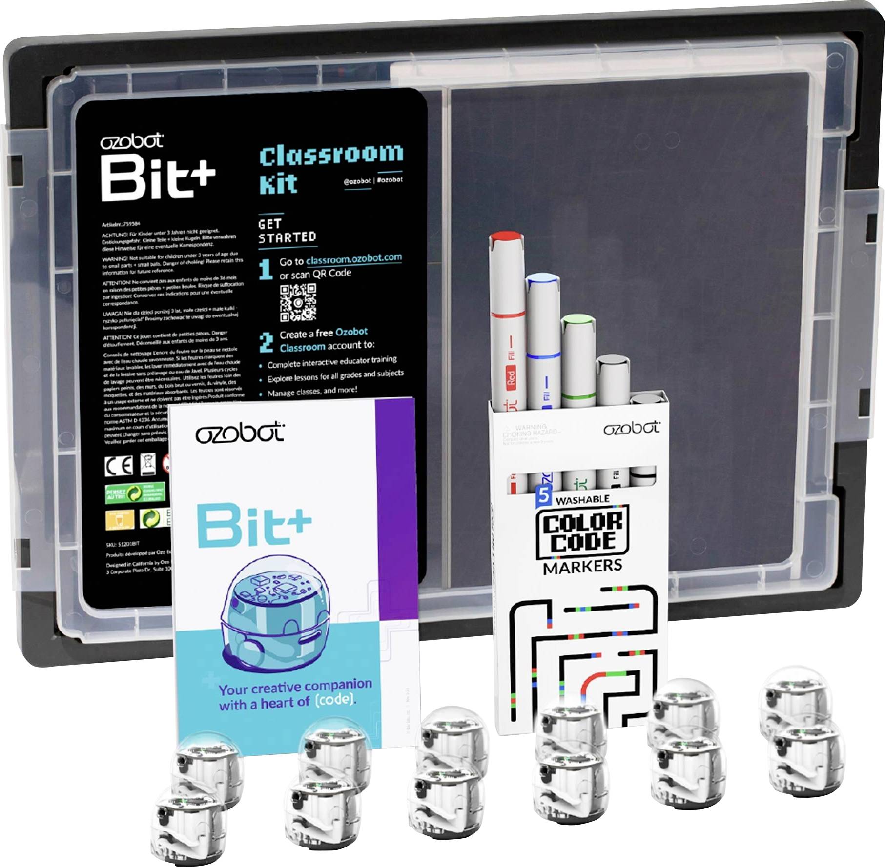 Ozobot Bit+ Classroom Kit mit Markern, Codierungskarten und mehreren kleinen Roboterspielzeugen vor einem Aufbewahrungskoffer.