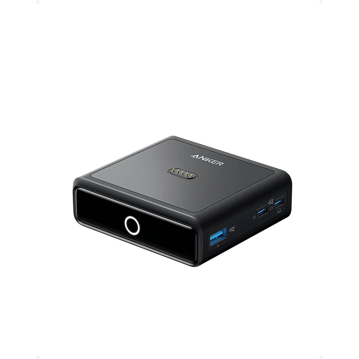 Kompakte schwarze Anker-Dockingstation mit USB-C-Anschluss an der Vorderseite, USB-A-Anschlüssen an der Seite und leuchtender kreisförmiger Stromanzeige.