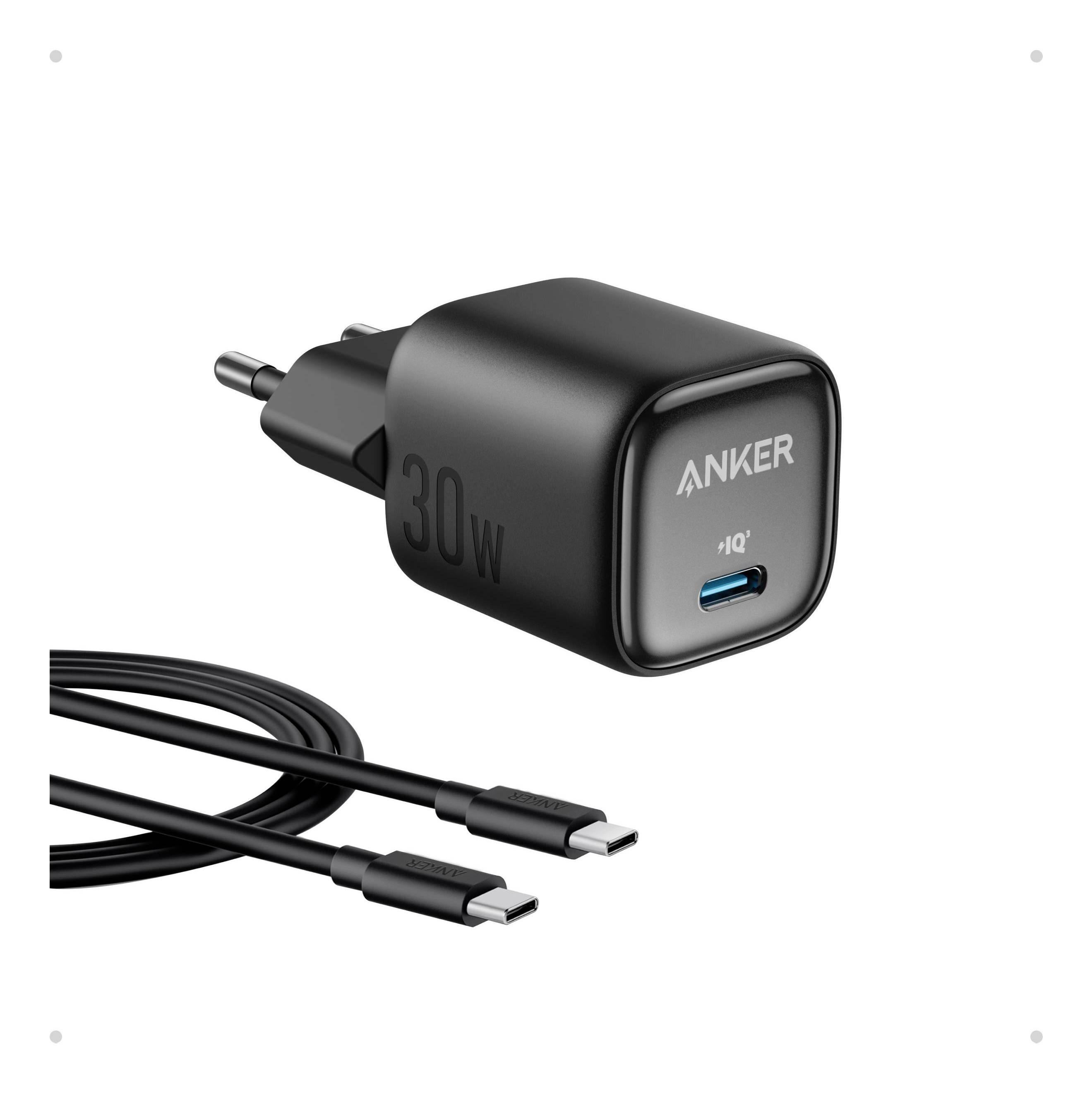 Schwarzes Anker 30W USB-C Wandladegerät mit Stecker und enthaltenem USB-C-Kabel auf weißem Hintergrund.