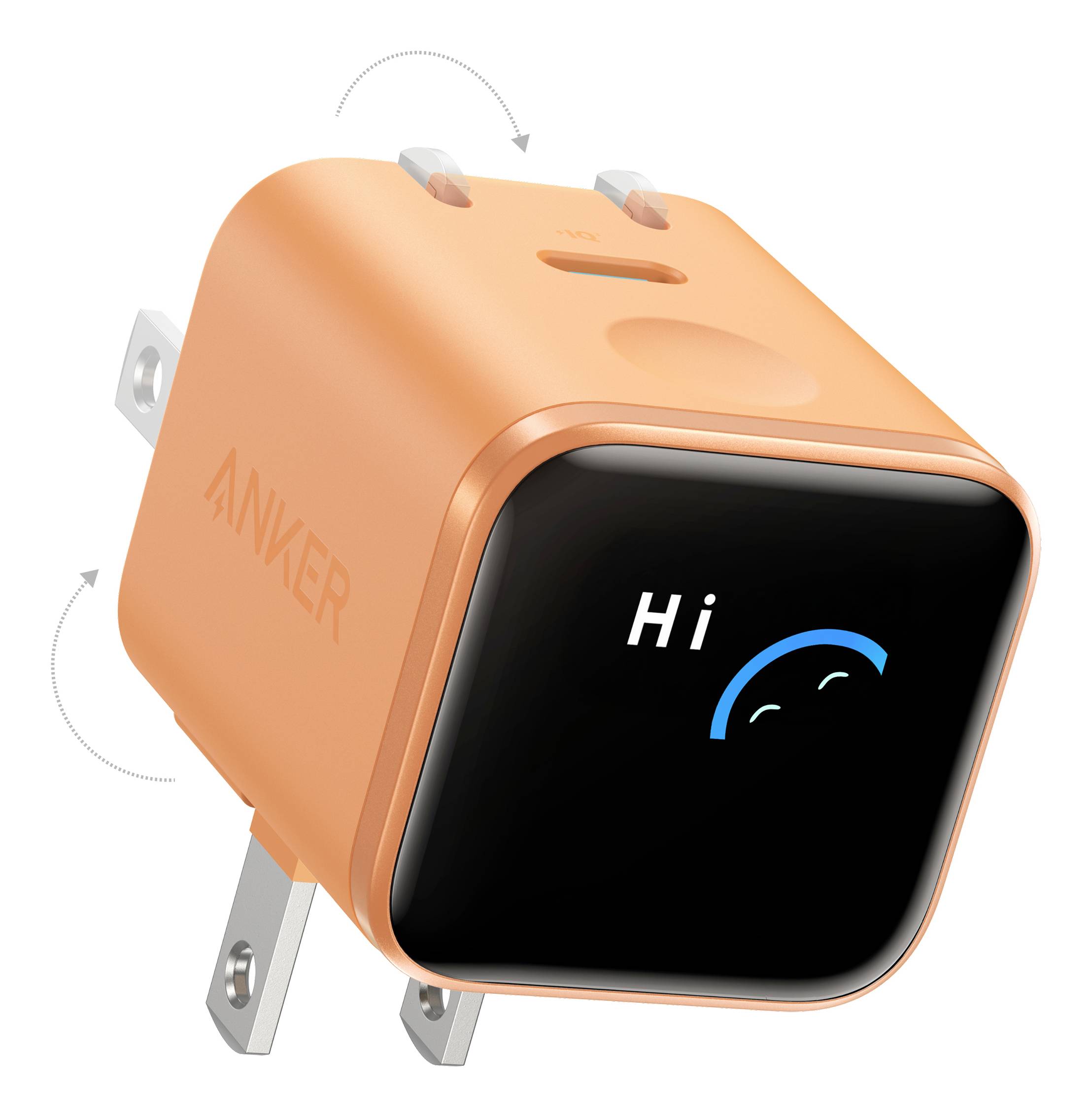 Orange Anker Wandladegerät mit zusammenklappbaren Stiften und einem vorderen Display, das 'Hi' und ein lächelndes Gesichtssymbol anzeigt.