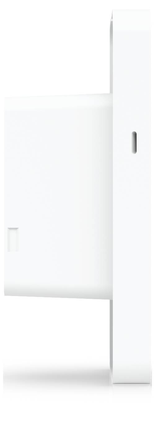 Minimalistisches weißes rechteckiges, an der Wand montiertes Gerät oder Panel mit einem schmalen vertikalen Schlitz und einer kleinen eingelassenen Öffnung, gezeigt vor einem einfachen weißen Hintergrund.