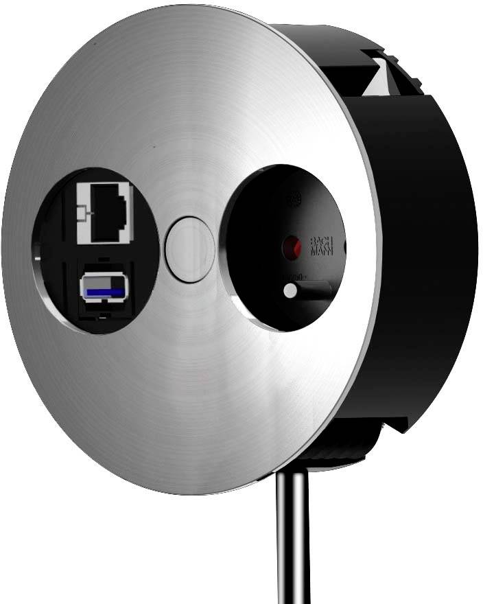 Nahaufnahme eines runden, wandmontierten Geräts mit gebürstetem Metallgesicht, das Ethernet- und USB-Anschlüsse auf der linken Seite und eine kreisförmige Sensor- oder Linsenöffnung auf der rechten Seite zeigt.