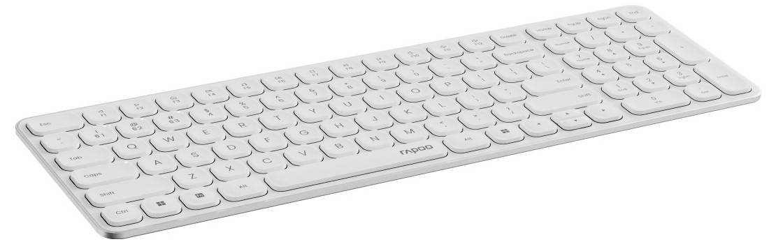 Schlanke weiße kabellose Tastatur in Schrägansicht auf einfachem Hintergrund.