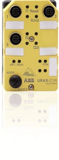 Gelbes ABB URAX-C1R Industriegerätepanel mit vier kreisförmigen Anschlüssen, beschrifteten Indikatoren und Schaltflächen, wahrscheinlich ein Sensor- oder Steuermodul.