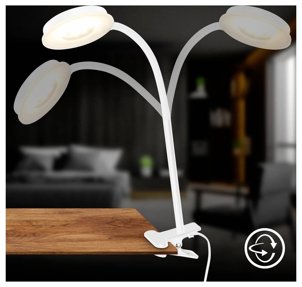 Weiße Schreibtischleuchte zum Anclipsen mit drei verstellbaren LED-Köpfen, befestigt an einem Holztisch in einem modernen Raum, mit einem Touchsteuerungssymbol unten rechts angezeigt.