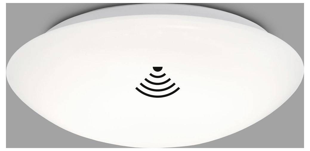 Weiße ovale Leuchte mit einem kleinen schwarzen Funksignalsymbol in der Mitte, dargestellt vor einem grauen Hintergrund.