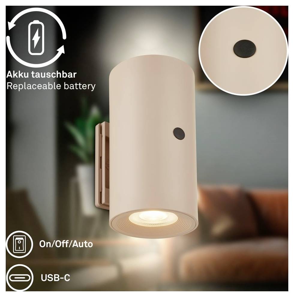 Zylindrische Wandleuchte mit austauschbarer Batterie, Ein-/Aus-/Automatik-Steuerung und USB-C-Ladung, dargestellt leuchtend in einem Wohnzimmer.