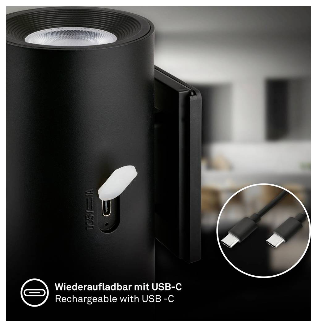 Tragbarer schwarzer Lautsprecher oder Lampe mit USB-C-Ladeanschluss und enthaltenem USB-C-Kabel; Text besagt „Wiederaufladbar mit USB-C