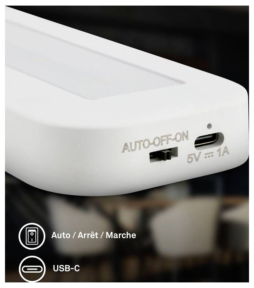Nahaufnahme eines weißen tragbaren Geräts, das einen AUTO-AUS-AN-Schalter und einen mit 5V 1A gekennzeichneten USB-C-Anschluss zeigt, mit Text auf dem Bild „Auto / Arrêt / Marche