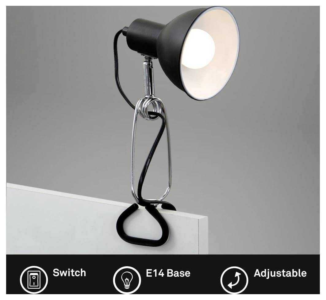 Klemmbare verstellbare Schreibtischlampe mit Schalter und E14-Fassung, die an eine Oberfläche gegen einen grauen Hintergrund geklemmt ist.