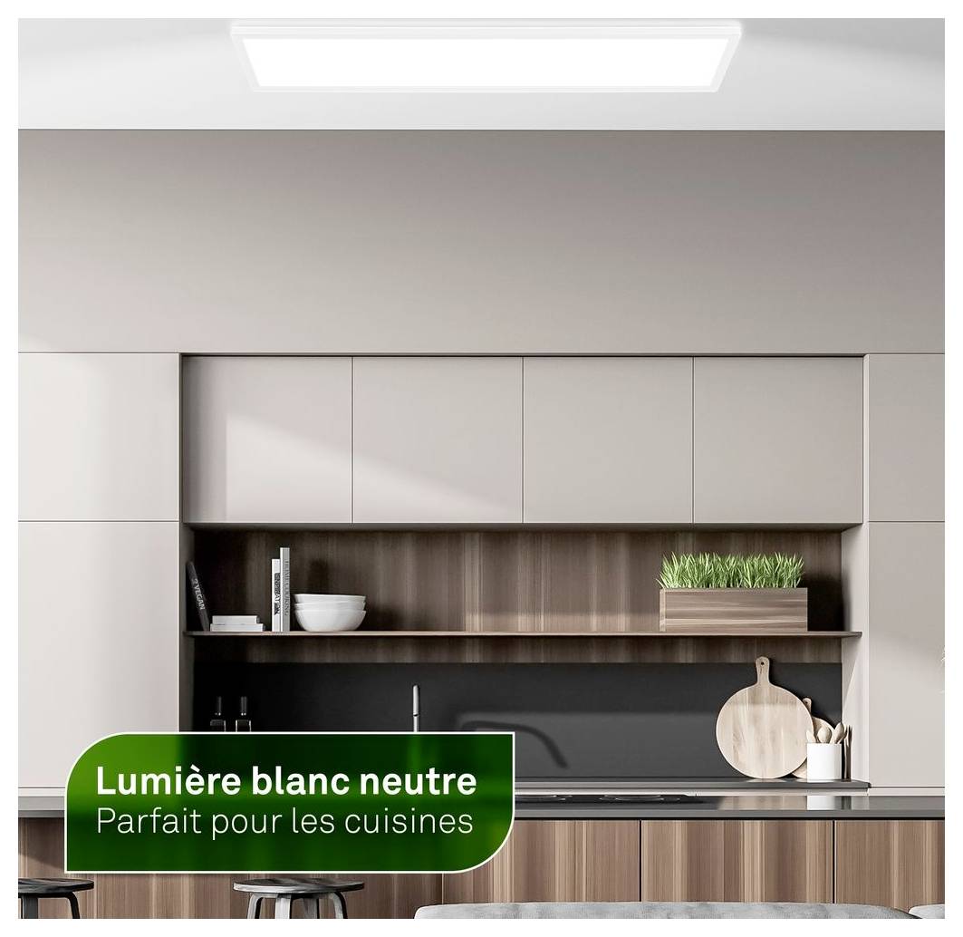 Moderne Kücheneinrichtung beleuchtet durch neutrales weißes Licht, mit französischem Textfeld, das „Lumière blanc neutre