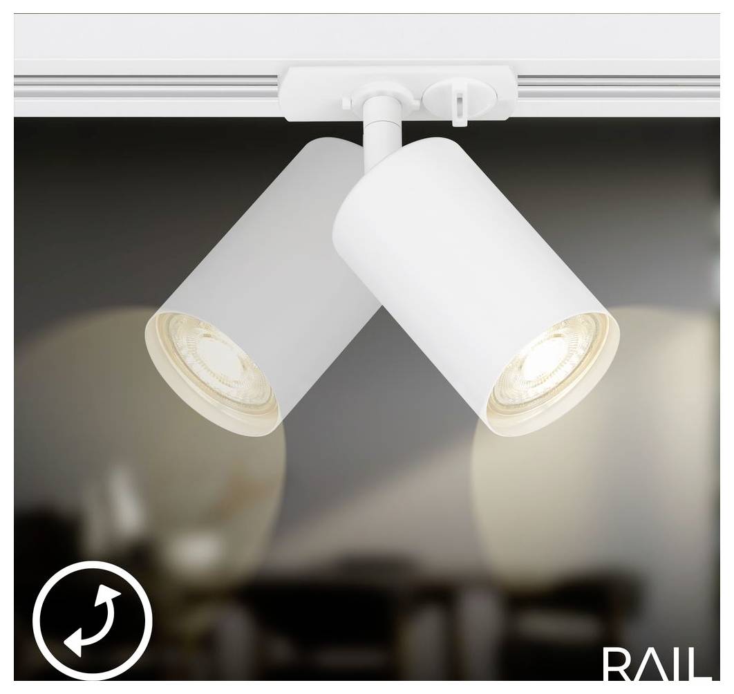 Zwei weiße Deckenspotlights auf einer Schiene, angewinkelt um den Raum auszuleuchten.