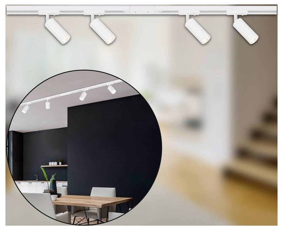 Schienenbeleuchtung mit weißen verstellbaren Spotlights an einer Decke, gezeigt in einem vergrößerten Kreis über einem unscharfen modernen Rauminterieur.