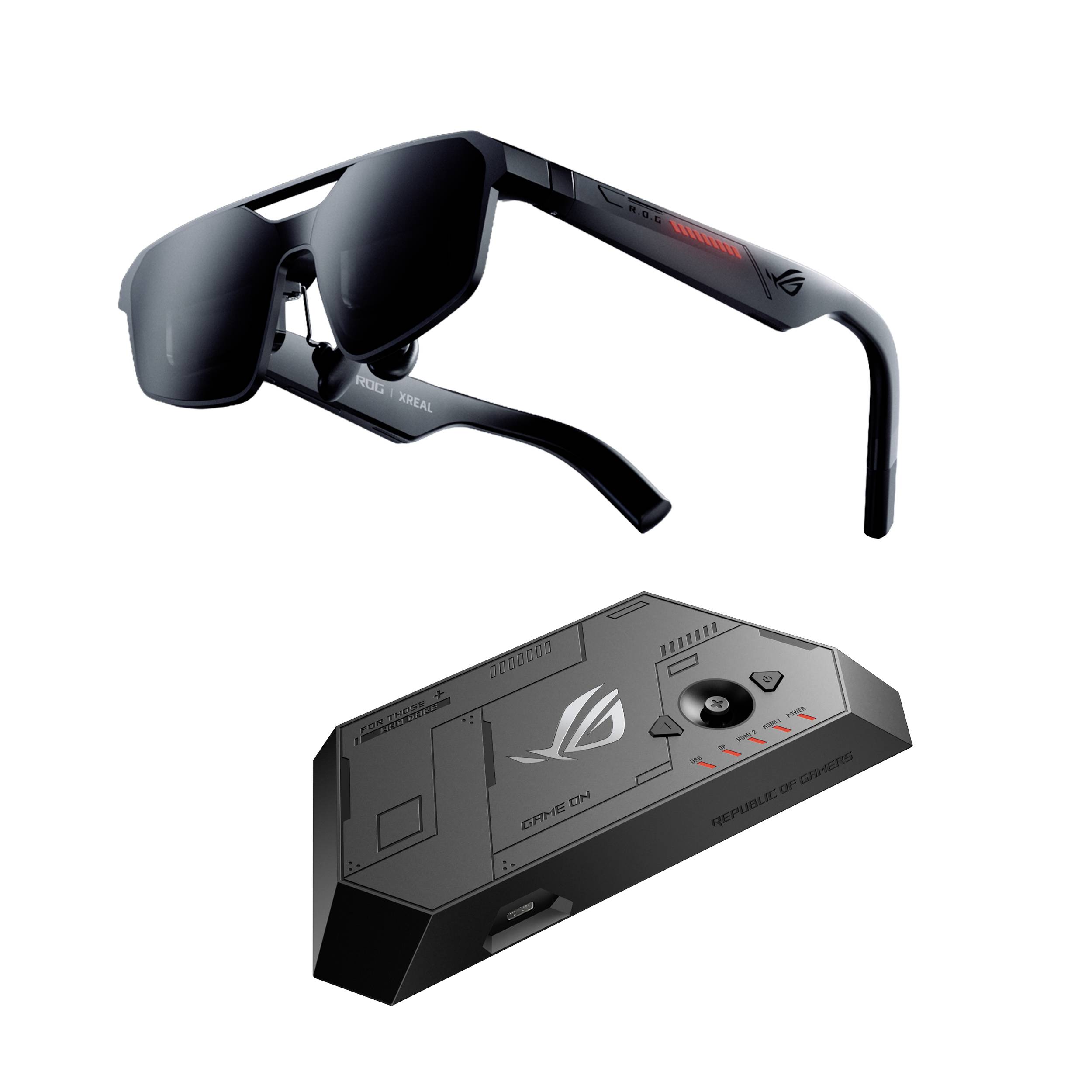 Schwarze ROG-Gaming-Sonnenbrillen über einer passenden grauen ROG-Ladestation/Basiseinheit, beide auf weißem Hintergrund dargestellt.