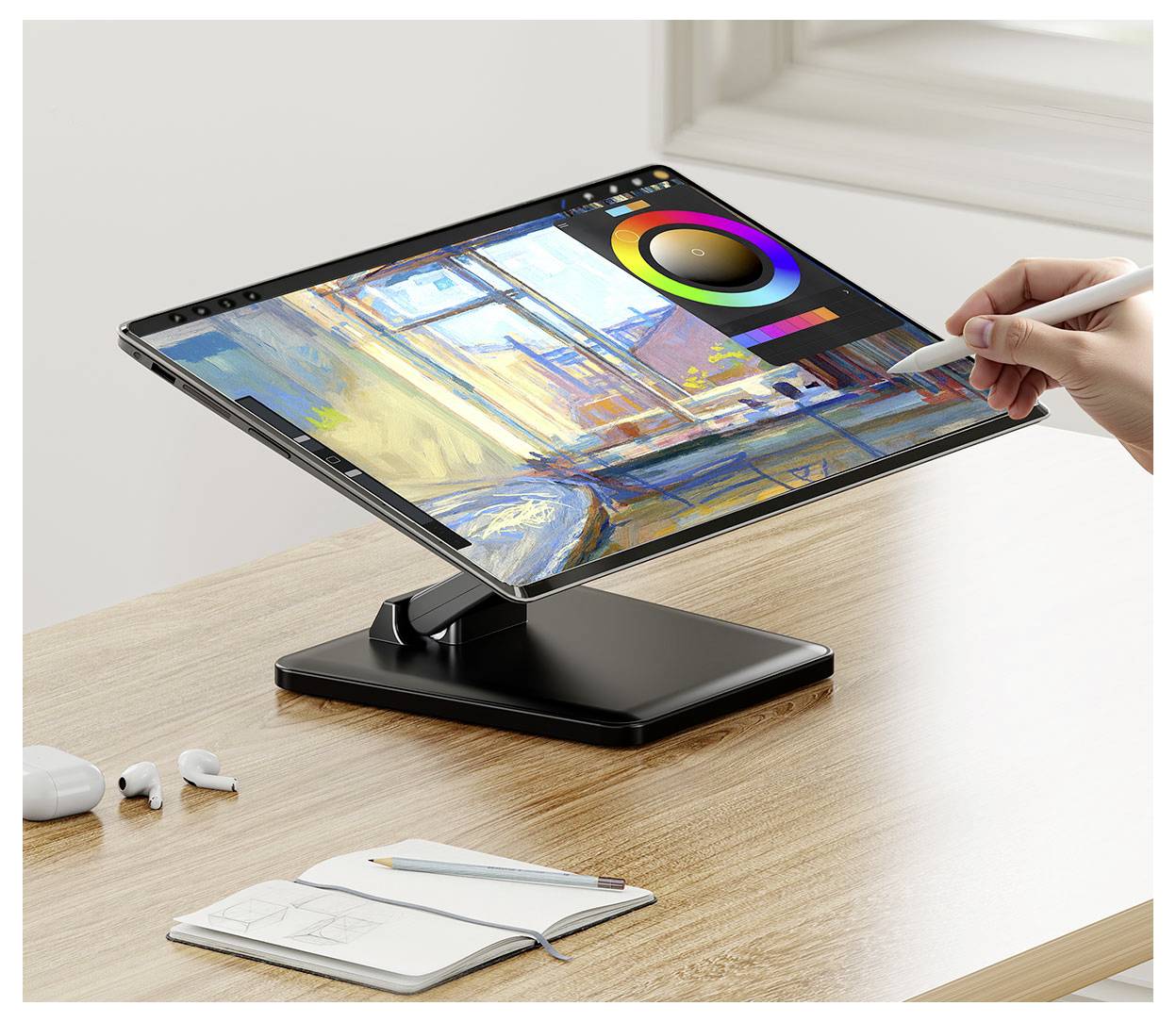 Hand verwendet einen Stift, um auf einem schwebenden Touchscreen-Display zu zeichnen, das ein Farbrad und eine digitale Malschnittstelle auf einem Schreibtisch zeigt.