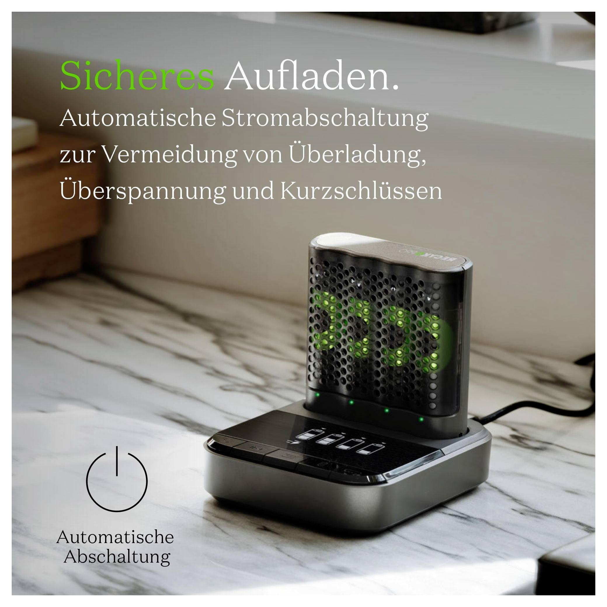Kompaktes Ladegerät auf einer Arbeitsplatte mit deutschem Text, das „Sicheres Aufladen