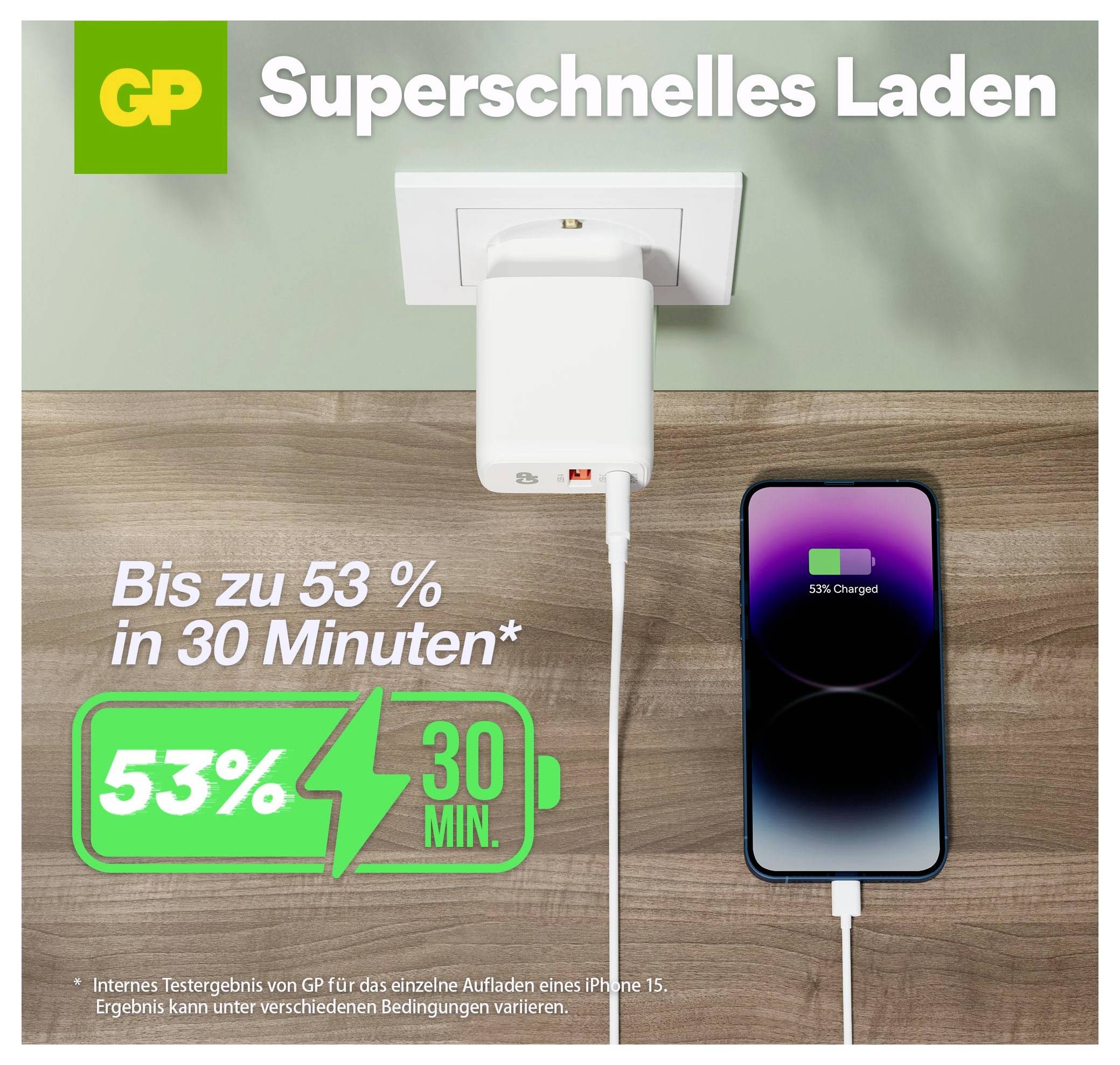 GP-Anzeige mit einem Ladegerät, das in eine Wandsteckdose gesteckt ist und ein Telefon auf einem Schreibtisch auflädt, mit dem Text „Schnelles Laden