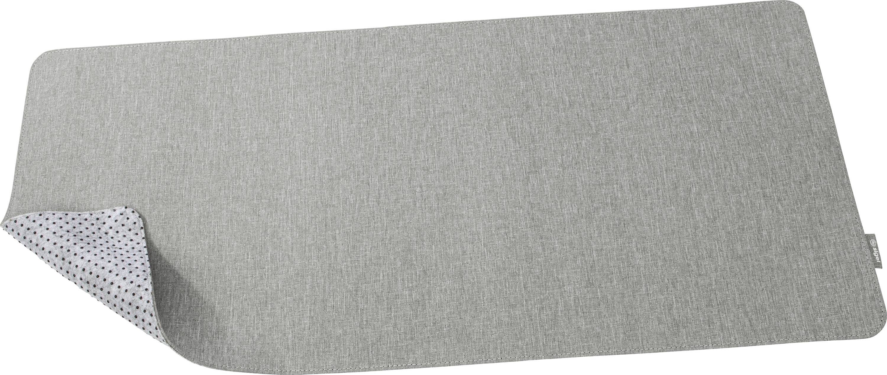 Grau rechteckige umkehrbare Matte mit weißer gepunkteter Unterseite, Ecke nach oben geklappt, auf schlicht weißem Hintergrund gezeigt.