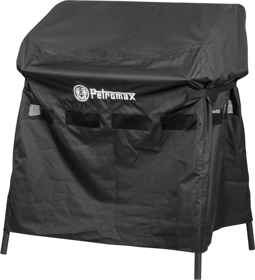 Schwarze Petromax-Grill- oder Feuerstellen-Abdeckung, die über eine rechteckige Außenkocheinheit passt, mit Seitenöffnungen und vier sichtbaren Beinen.