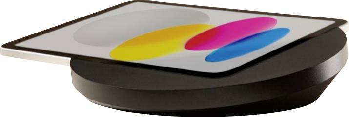 Ein tablet-ähnliches Gerät ruht geneigt auf einer schwarzen kreisförmigen Basis und zeigt drei farbenfrohe ovale Formen auf seinem Bildschirm vor einem beigen Hintergrund.