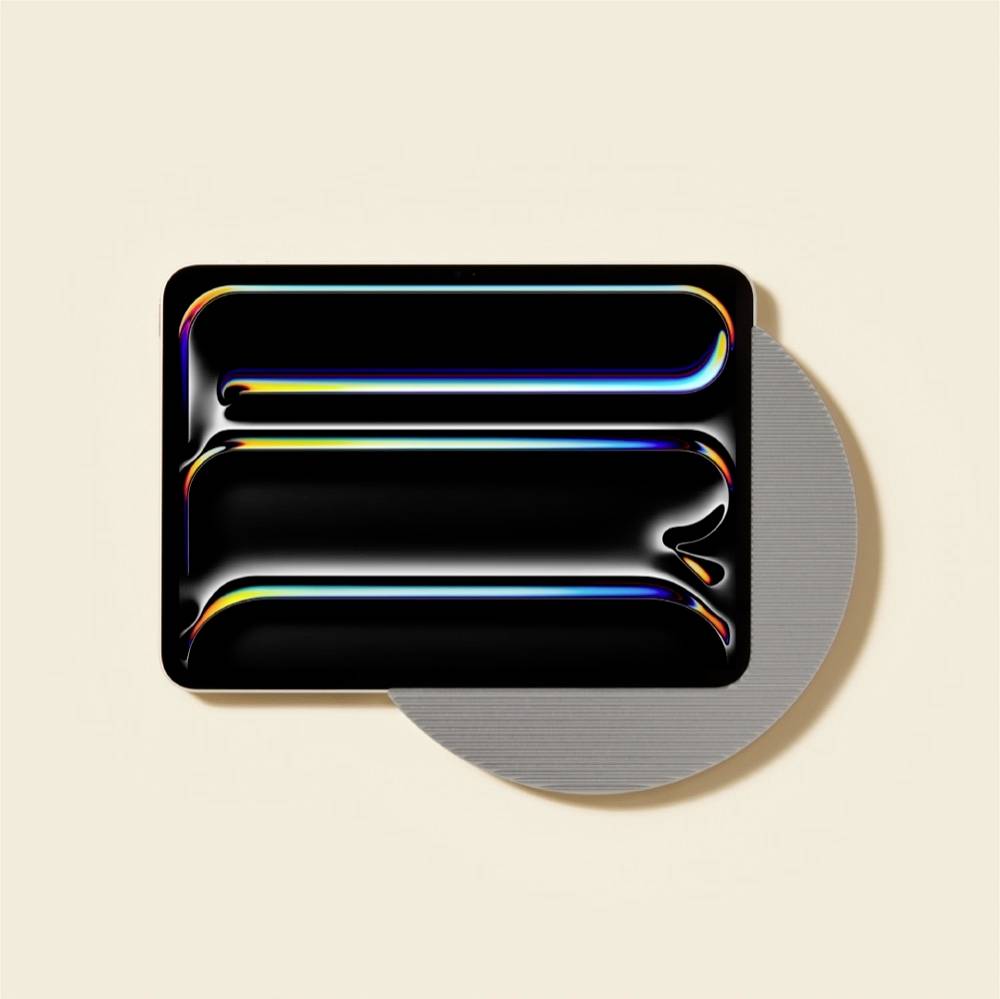 Abstrakter schwarzer Rechteck mit abgerundeten Ecken mit neonregenbogenfarbigen Highlights und grauem kreisförmigem Hintergrund, das wie ein stilisiertes App-Symbol oder Logo wirkt.