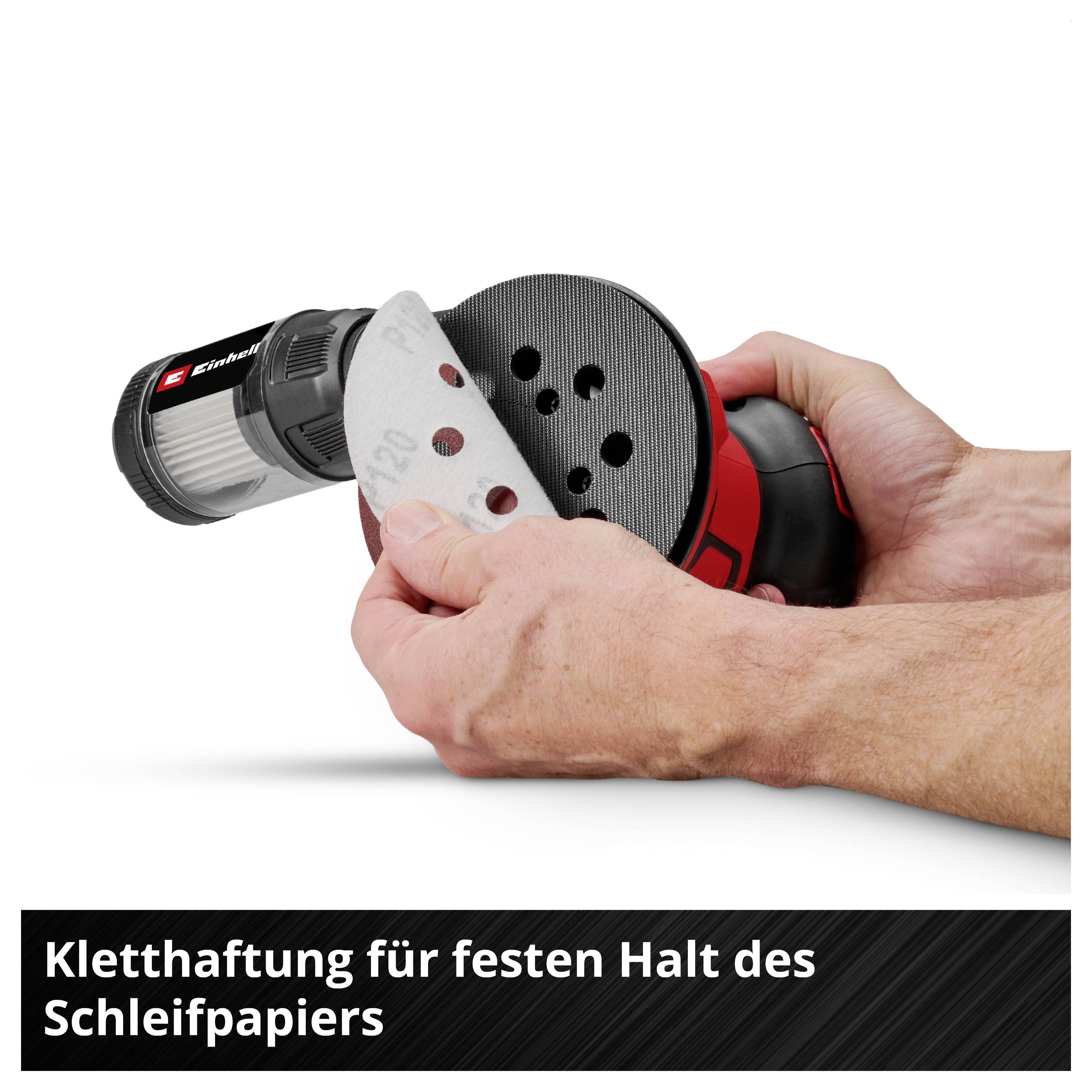 Hand hält einen Exzenterschleifer und befestigt Schleifpapier per Klett auf der Schleiftellerfläche; Hinweis: 'Kletthaftung für festen Halt des Schleifpapiers'.