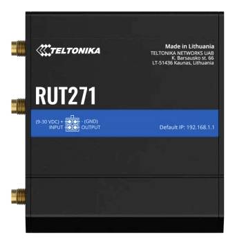 Schwarzer Teltonika RUT271 Industrie-Router mit drei goldenen Antennensteckern und blauem Etikett, auf dem die Standard-IP 192.168.1.1 angezeigt wird.