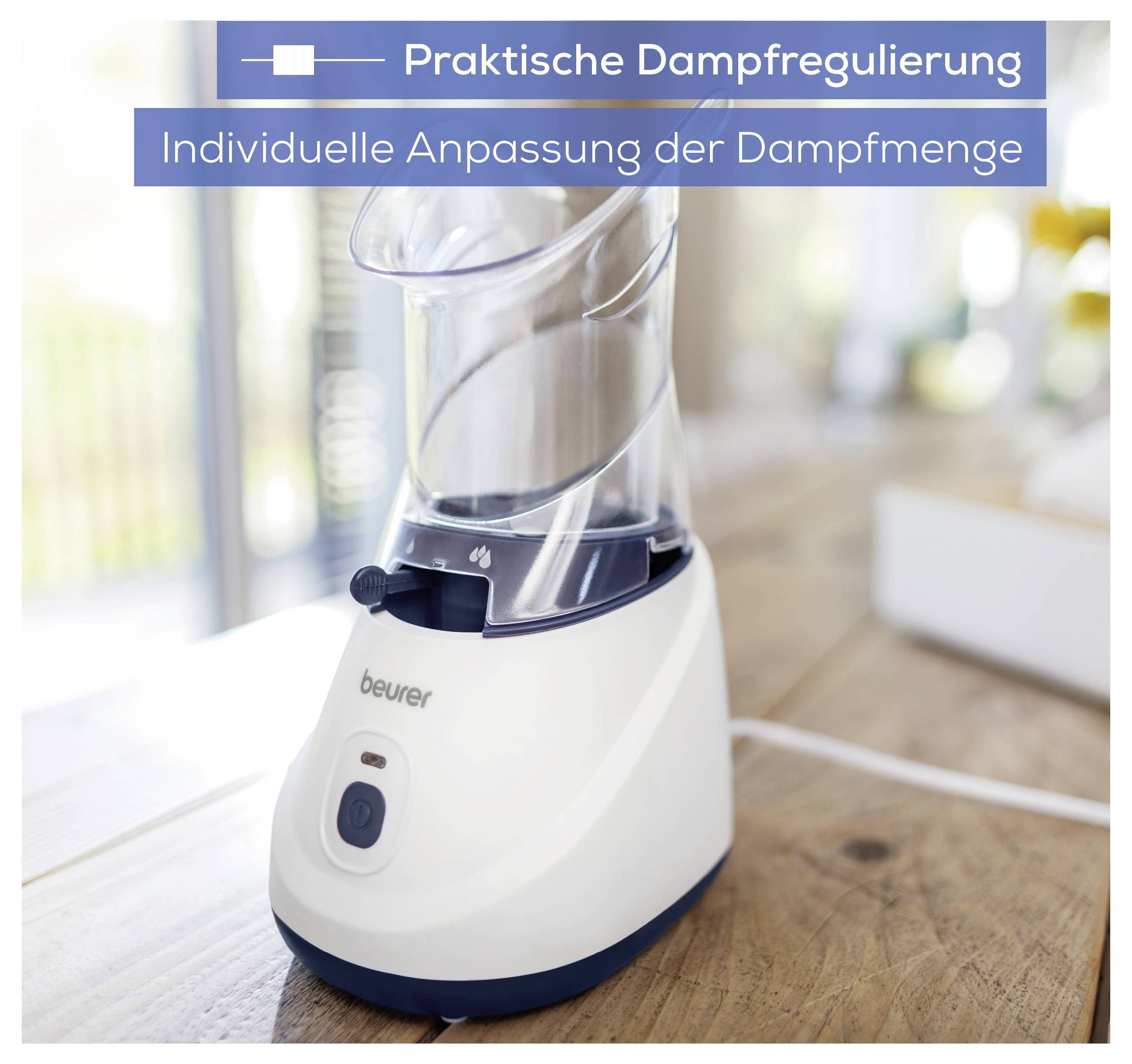Standbild eines weißen Dampfinhalators auf einem Holztisch; Text oben: 'Praktische Dampfregulierung' und 'Individuelle Anpassung der Dampfmenge'.