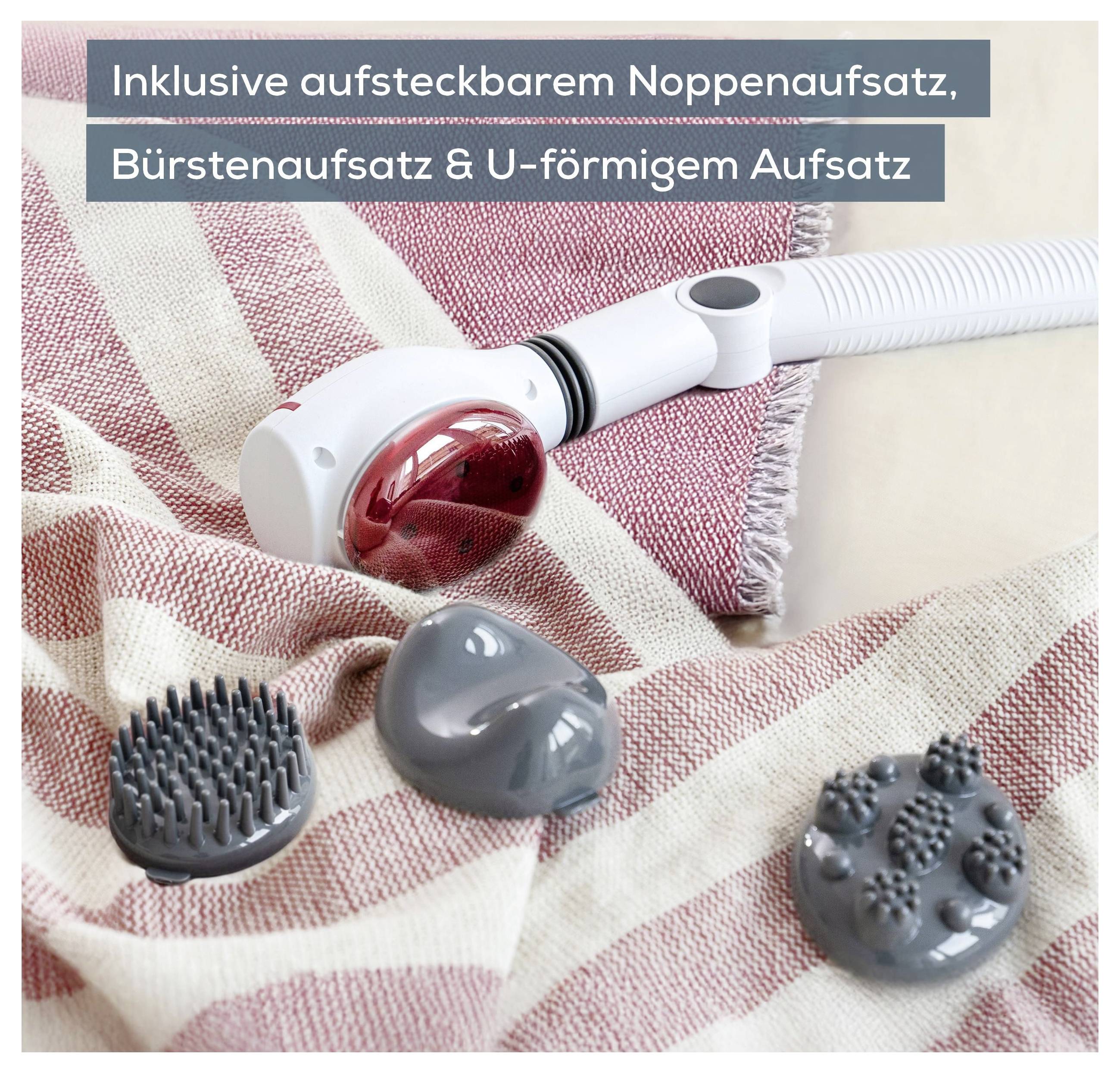 Staubsaugeraufsatz mit austauschbaren Köpfen: Noppen-, Bürsten- und U-förmiger Aufsatz neben einem Sauger auf kariertem Tuch.