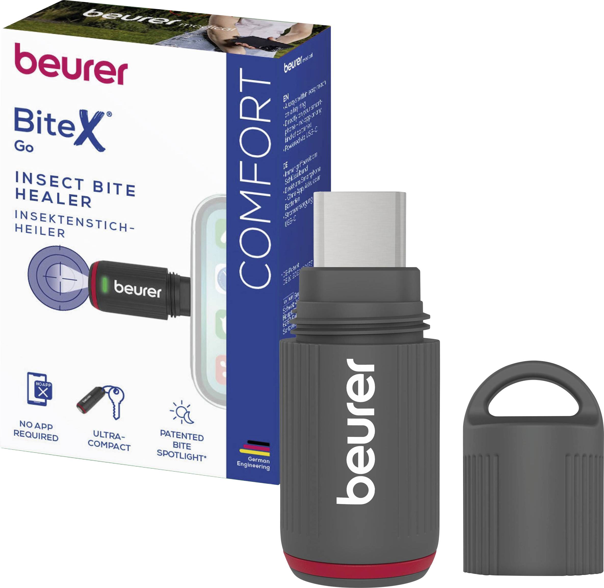 Beurer BiteX Go Insektenstich-Heilgerät mit USB-C-Ladegerät, abgebildet mit Produktverpackung und Schutzkappe.