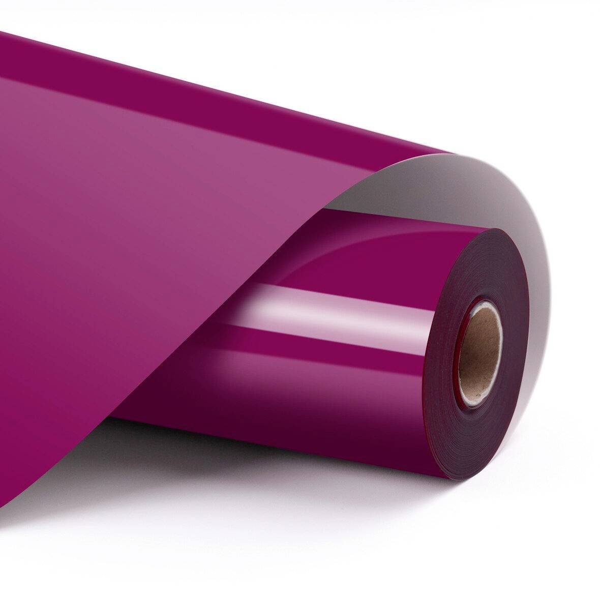 Aufgerollte magentafarbene Vinylfolie mit glänzender Oberfläche auf weißem Hintergrund, teilweise abgerollt, um den Kern der Rolle zu zeigen.