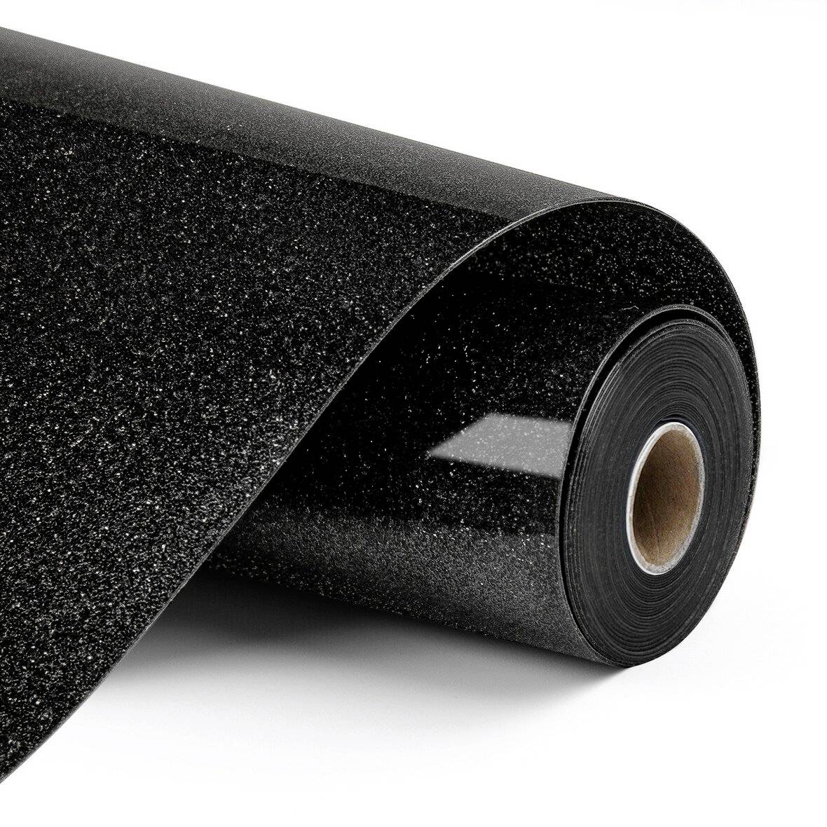 Rolle aus schwarzem glitzerndem strukturiertem Material, das auf weißem Hintergrund ausgerollt ist