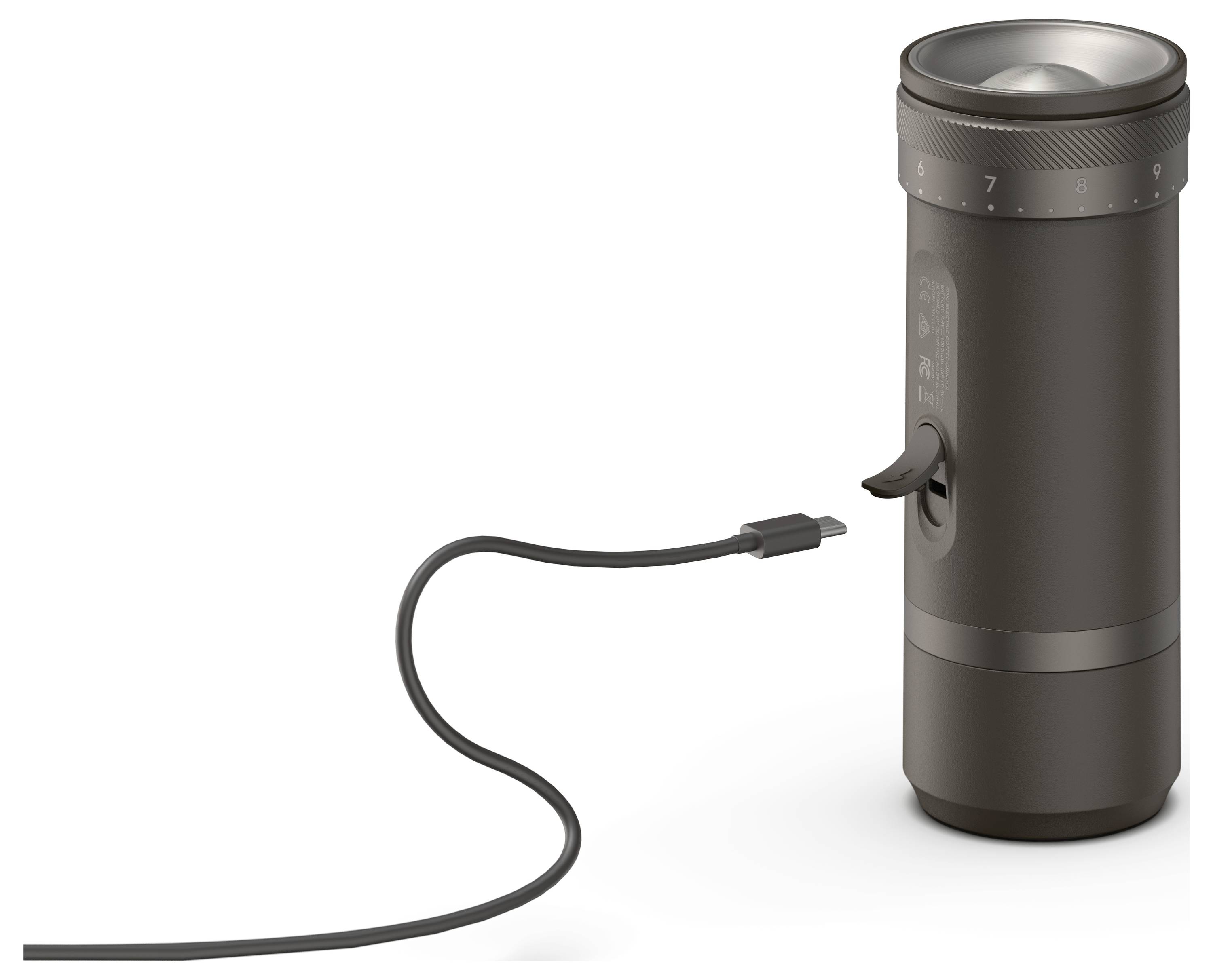 Ein schwarzes zylindrisches tragbares Gerät mit angeschlossenem USB-Kabel, aufrecht auf weißem Hintergrund dargestellt.