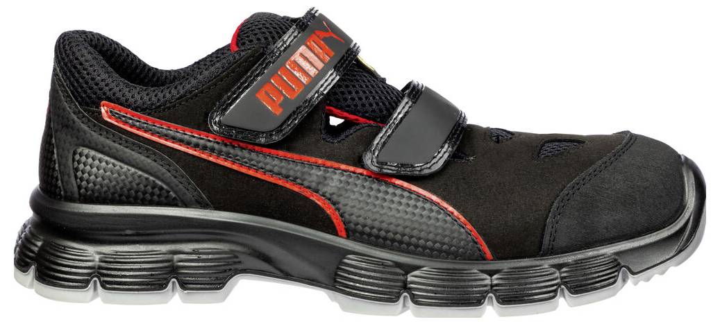 Schwarzer Puma-Sportschuh mit roten Akzenten und zwei Klettverschlussbändern, in Seitenansicht auf weißem Hintergrund dargestellt.